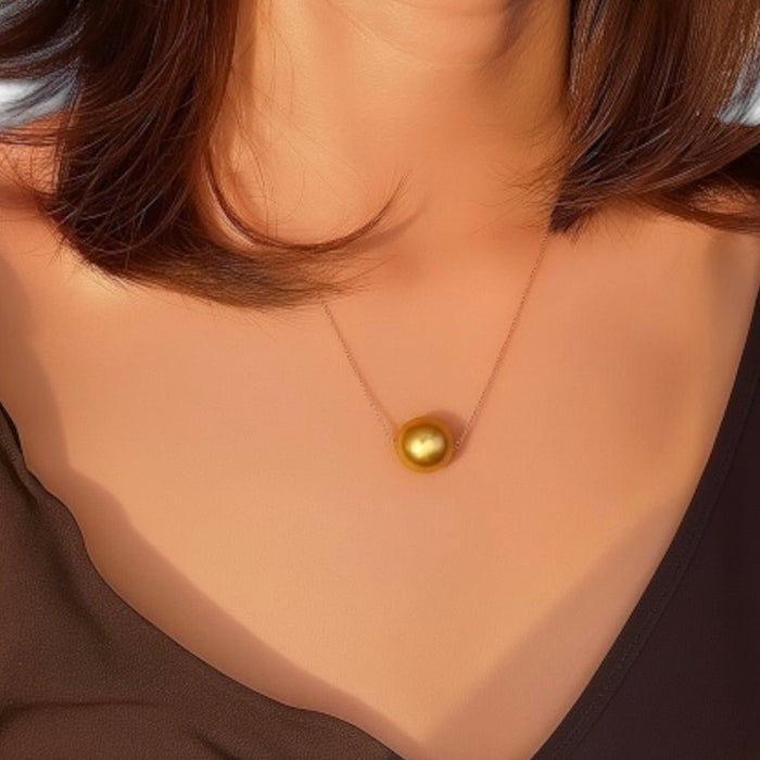 South Sea Elegance: Floating Necklace – AAAA 11–12 mm Golden South Sea Pearl in 18K Gold